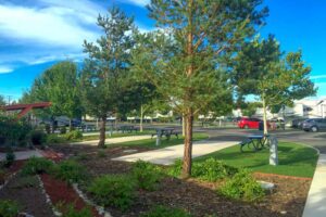 Beautifully landscaped RV park with maturing trees, well-kept grounds, and inviting curb appeal at Sparks Marina