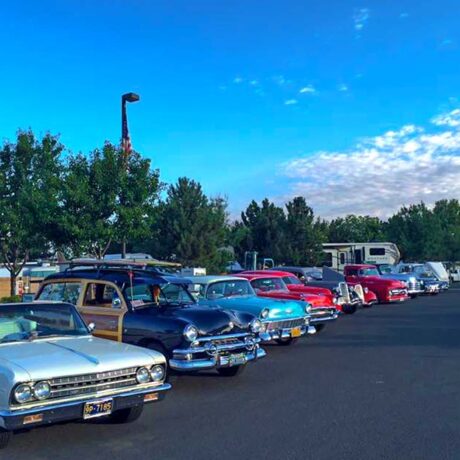 Classic cars lined up at Hot August Nights in Reno, NV, celebrating vintage vehicles and hot rod culture with vibrant displays