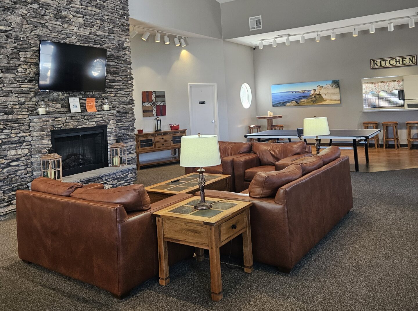 Modern clubhouse with pool table and ping pong at Sparks Marina RV Park, ideal for relaxation and social activities