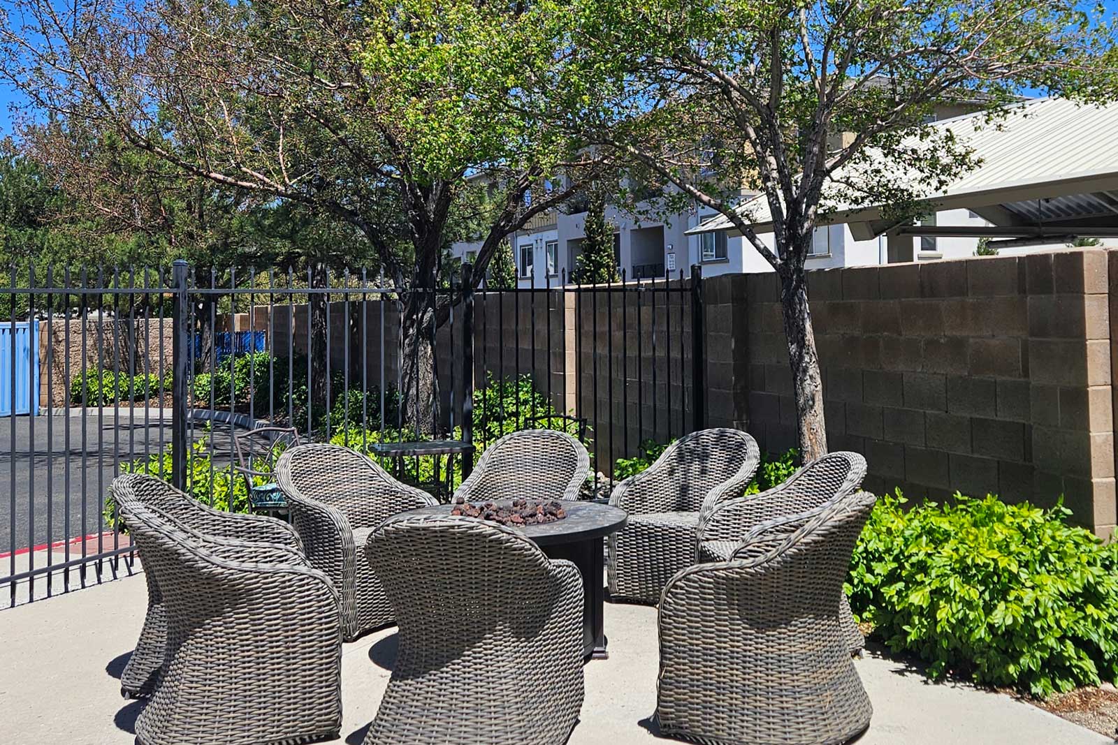 BBQ patio with grill and cozy outdoor fire pit area at Sparks Marina RV Park, perfect for gatherings and evening relaxation